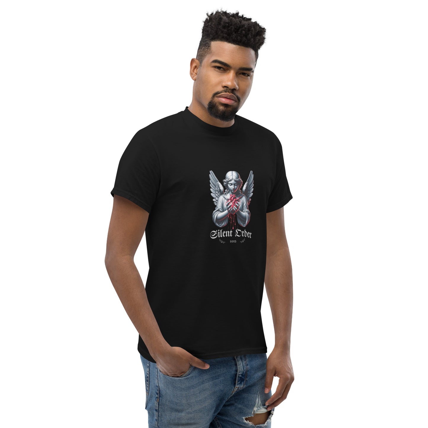 Man wearing a black t-shirt with a graphic design on a white background
