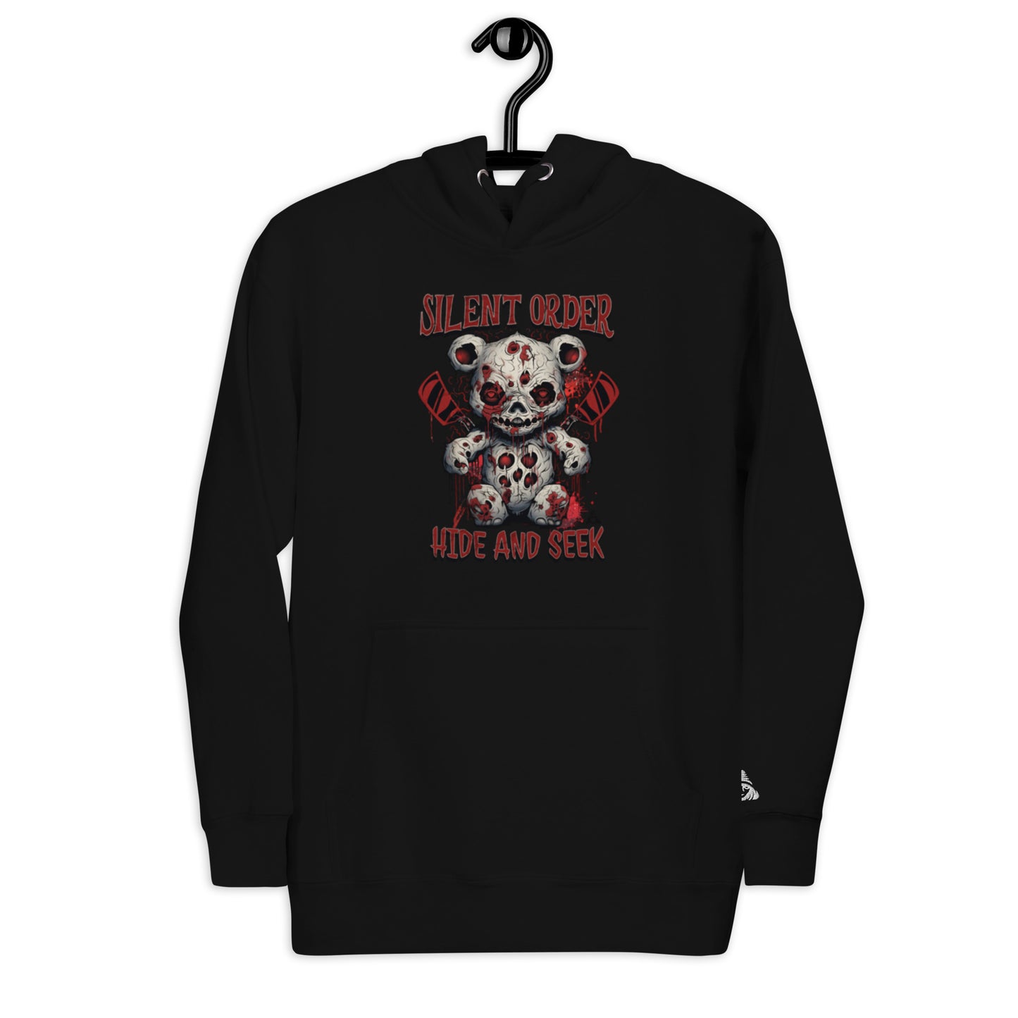 Black hoodie with a graphic design of a teddy bear and text on a hanger against a white background