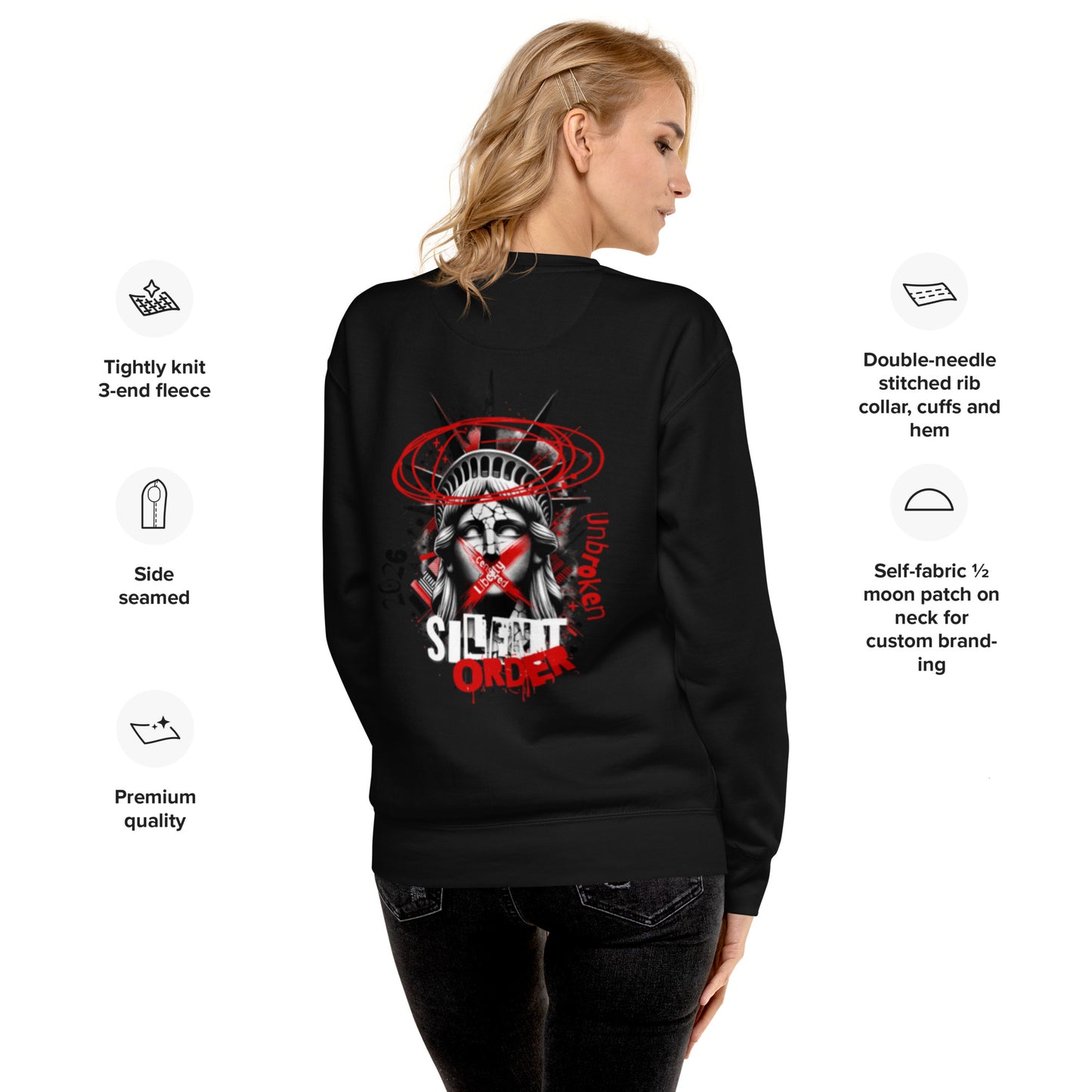 Person wearing a black long-sleeve shirt with a graphic design on the back, on a white background.