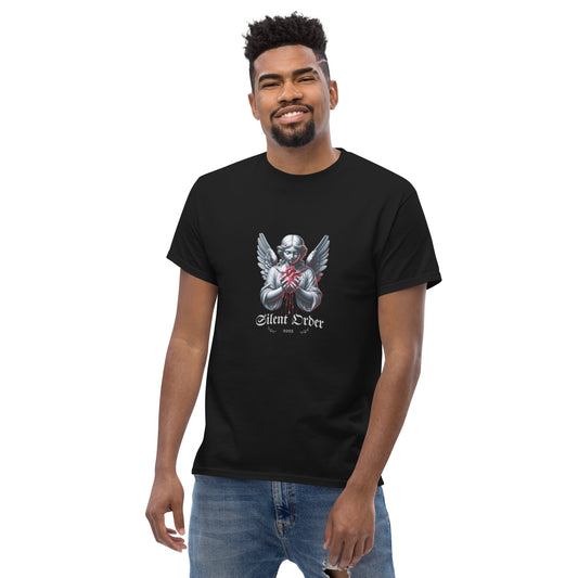 Man wearing a black t-shirt with a graphic design on a white background