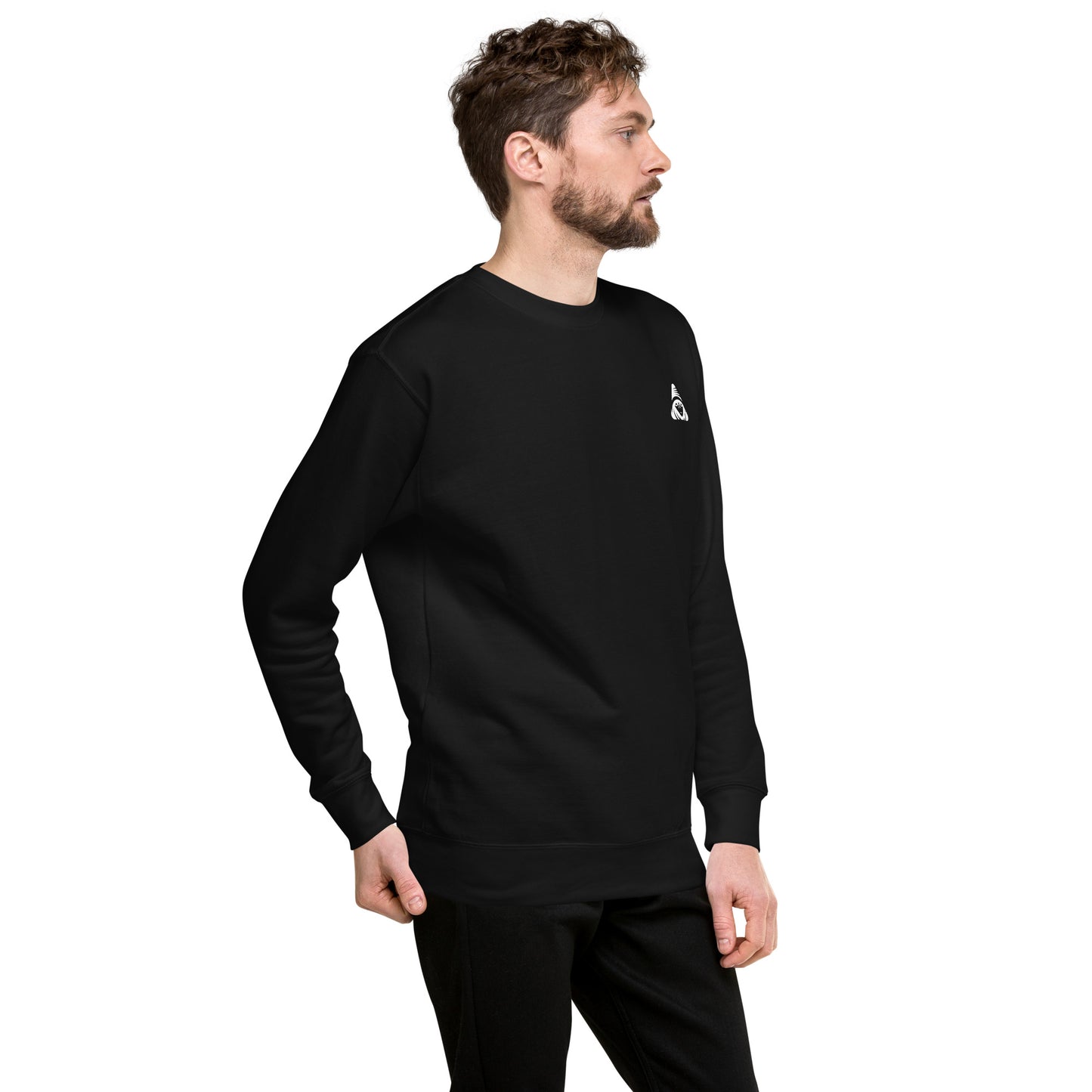 Man wearing a black sweatshirt with a logo on a white background