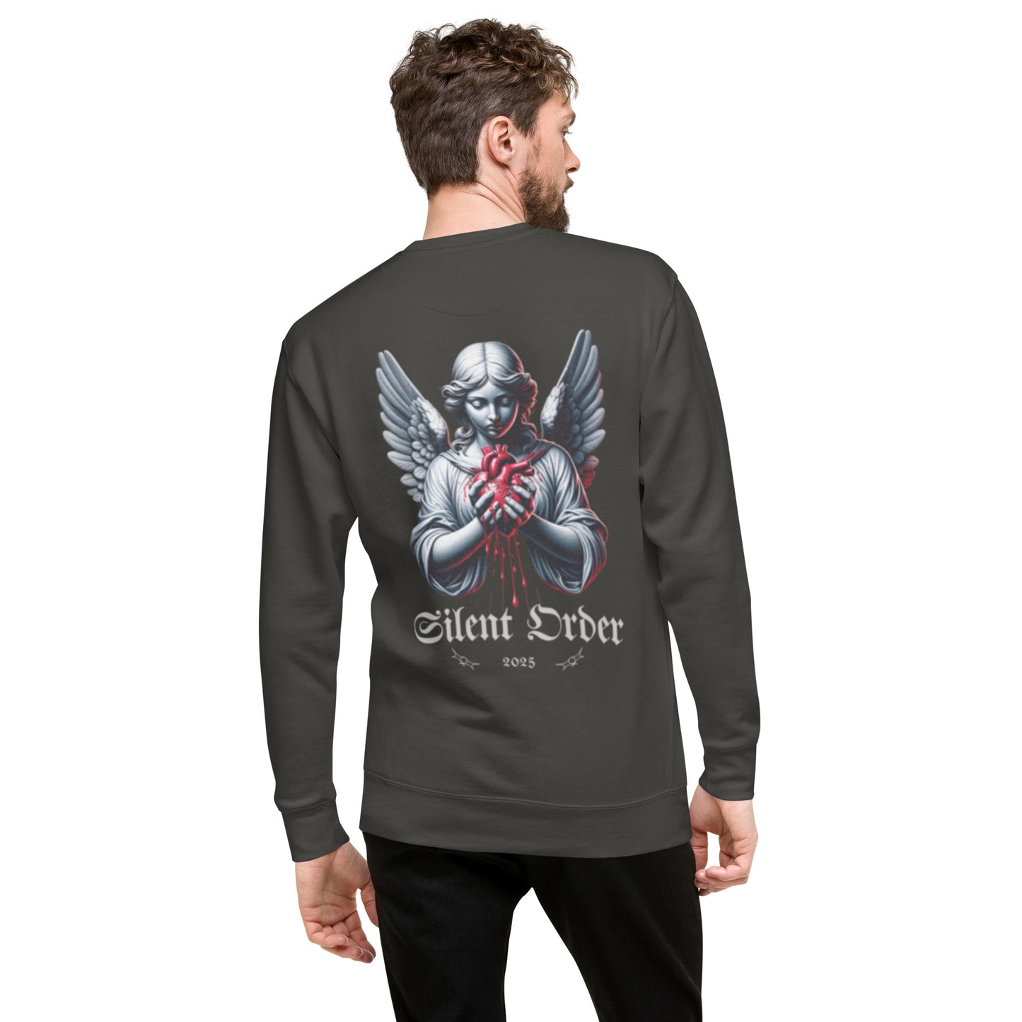 Man wearing a dark gray sweatshirt with an angel graphic and 'Silent Order' text on the back.