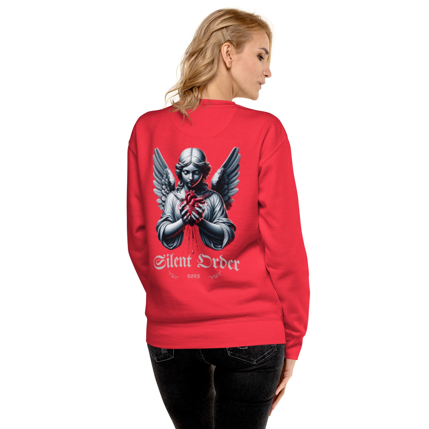 Person wearing a red sweatshirt with an angel design and 'Silent Order' text on the back.