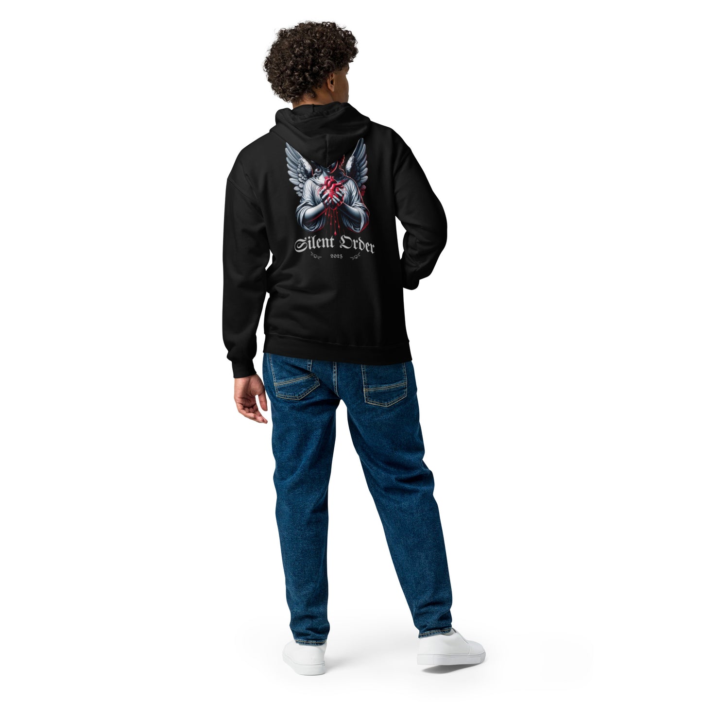 Person wearing a black hoodie with a design on the back, standing against a white background