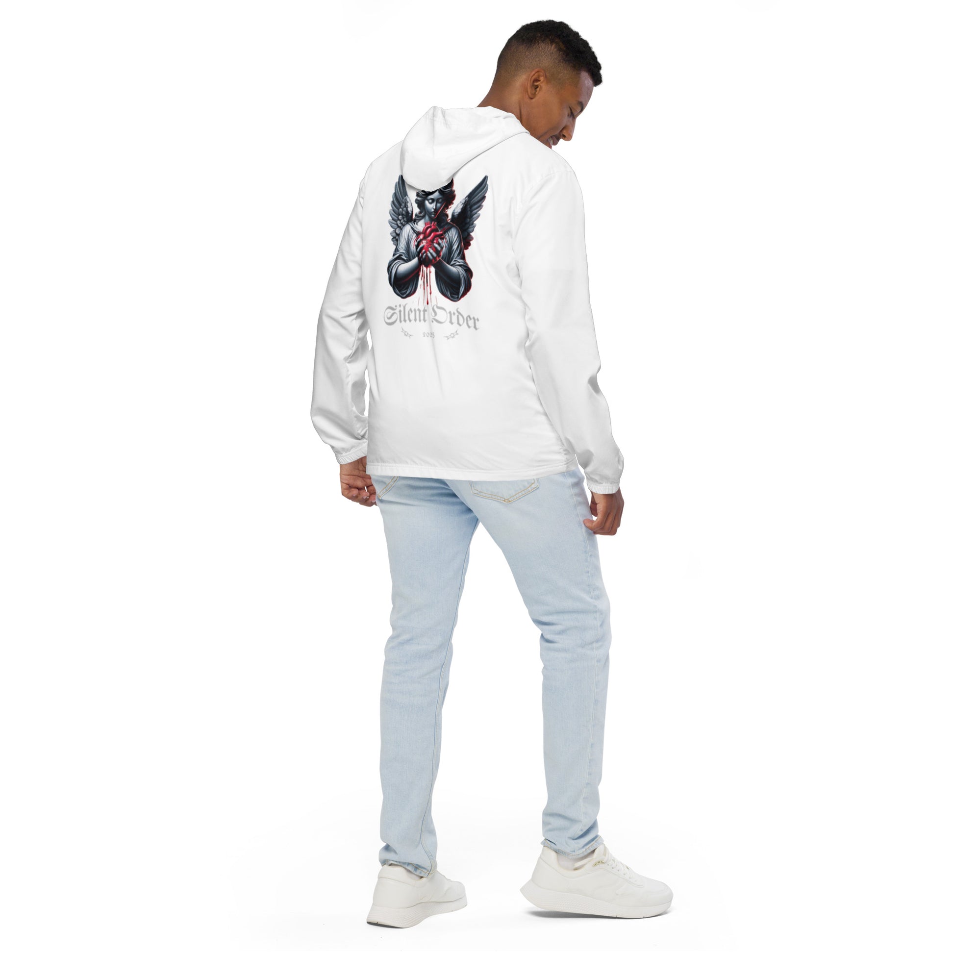 Person wearing a white hoodie with a graphic design on the back, standing against a white background