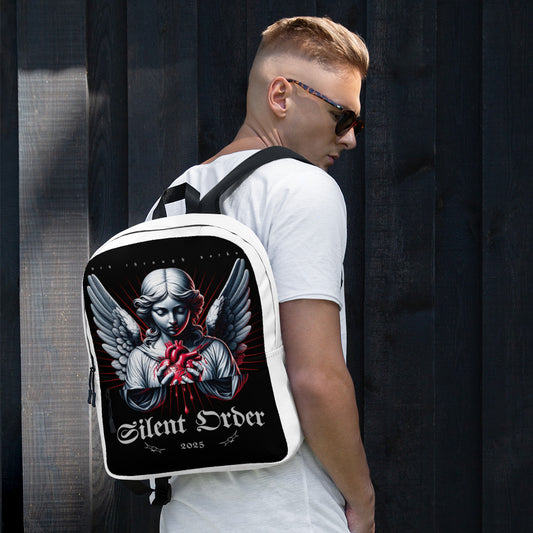 Man wearing a white backpack with an angel design and 'Silent Order' text.