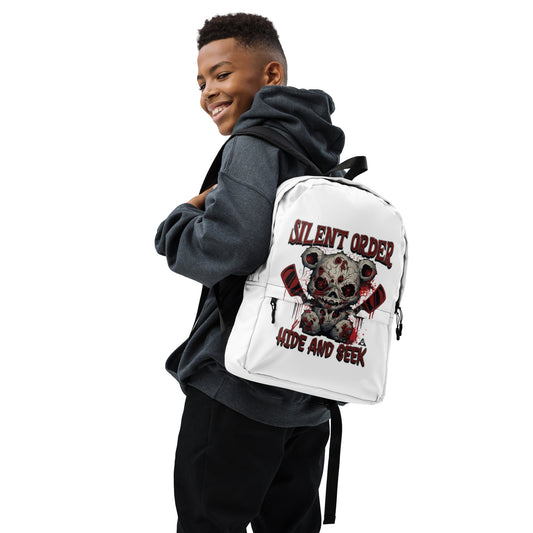 Person wearing a white backpack with a bear graphic and text, on a white background