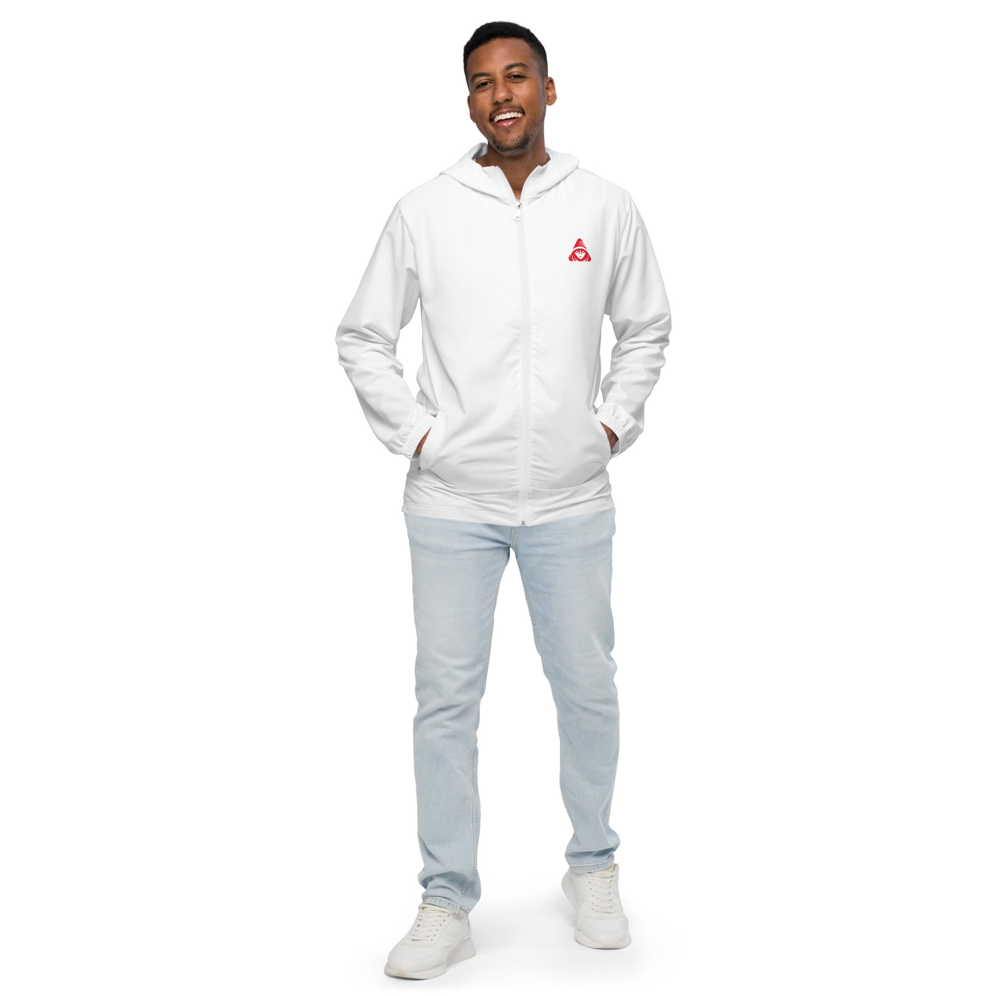 Man wearing a white hoodie with a red logo and light blue jeans on a white background