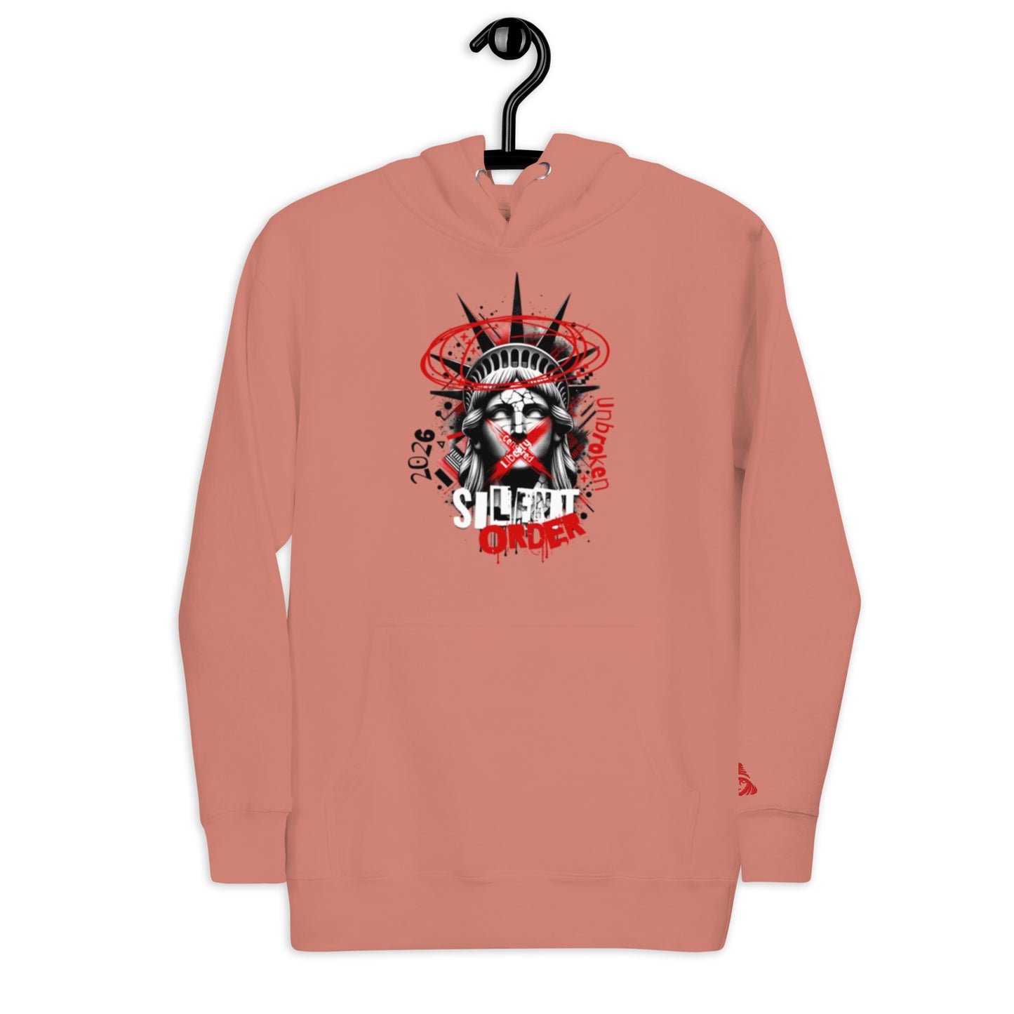 Coral hoodie with graphic design on a hanger against a white background
