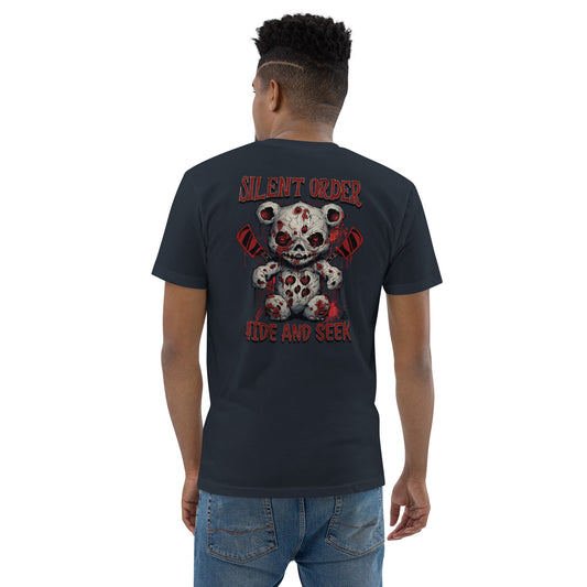 Person wearing a black t-shirt with a graphic design on the back, featuring text and a bear skull.