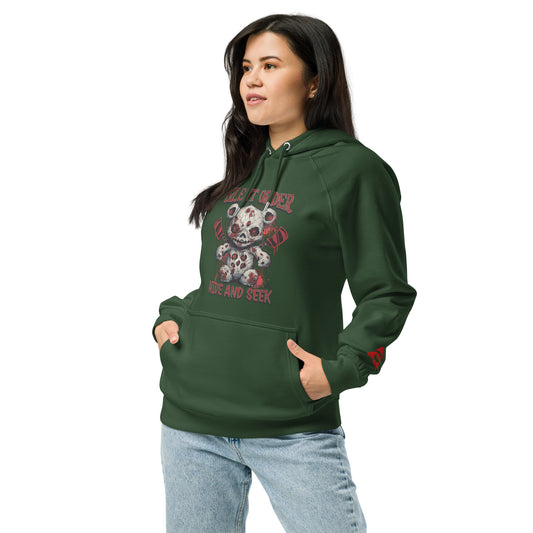 Woman wearing a green hoodie with a graphic design on a white background