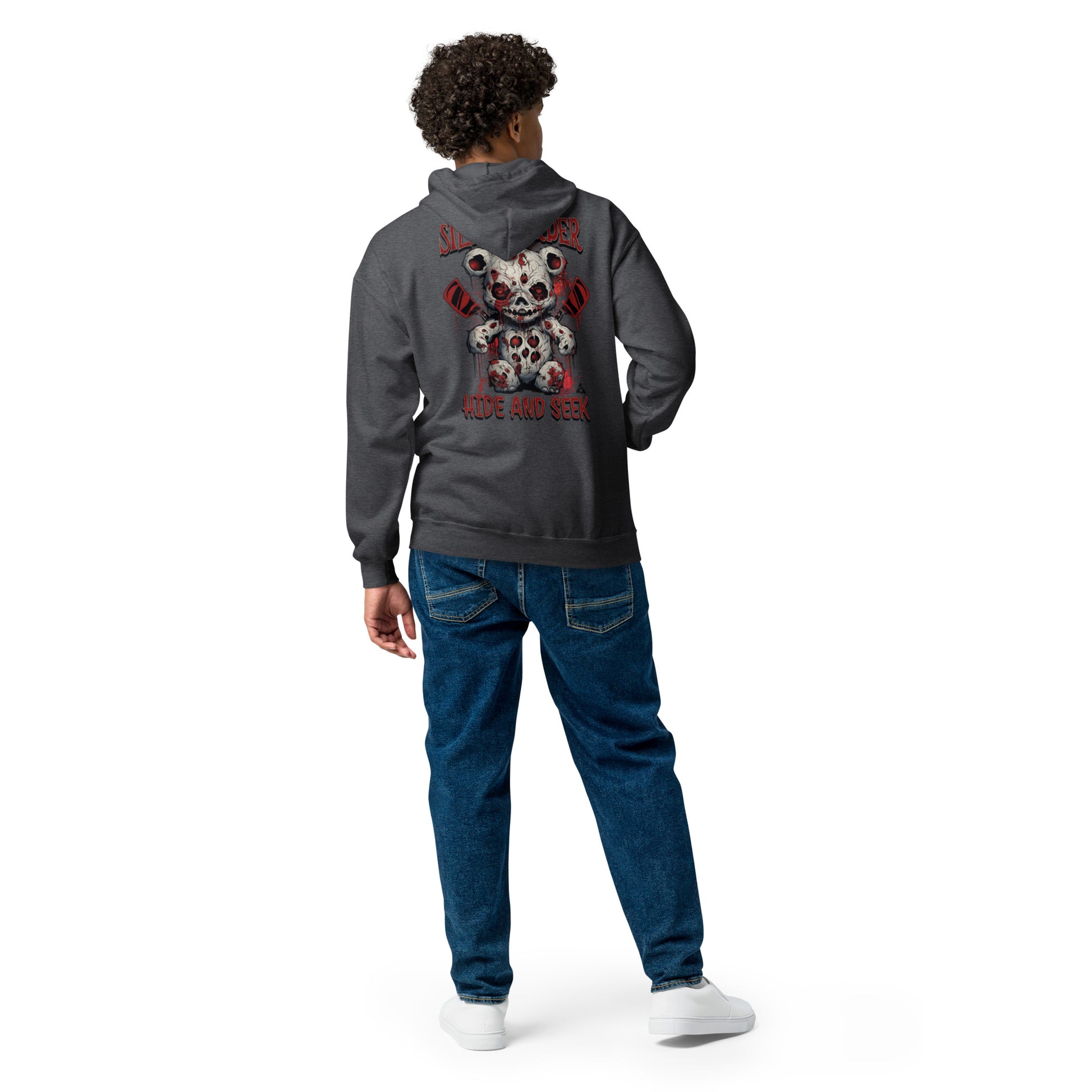 Person wearing a gray hoodie with a colorful graphic on the back, standing against a white background
