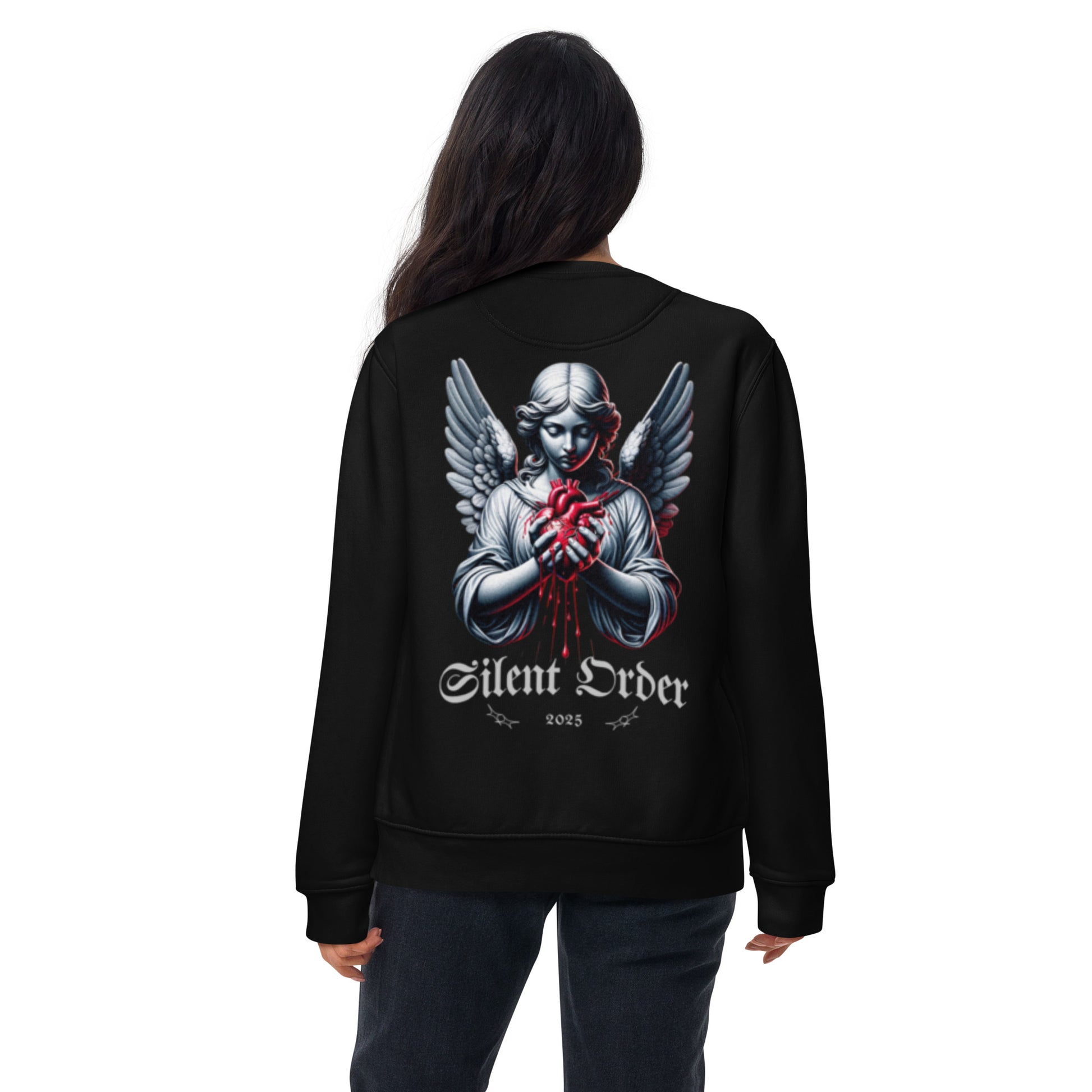 Black sweatshirt with an angel graphic and 'Silent Order' text on the back, worn by a person.