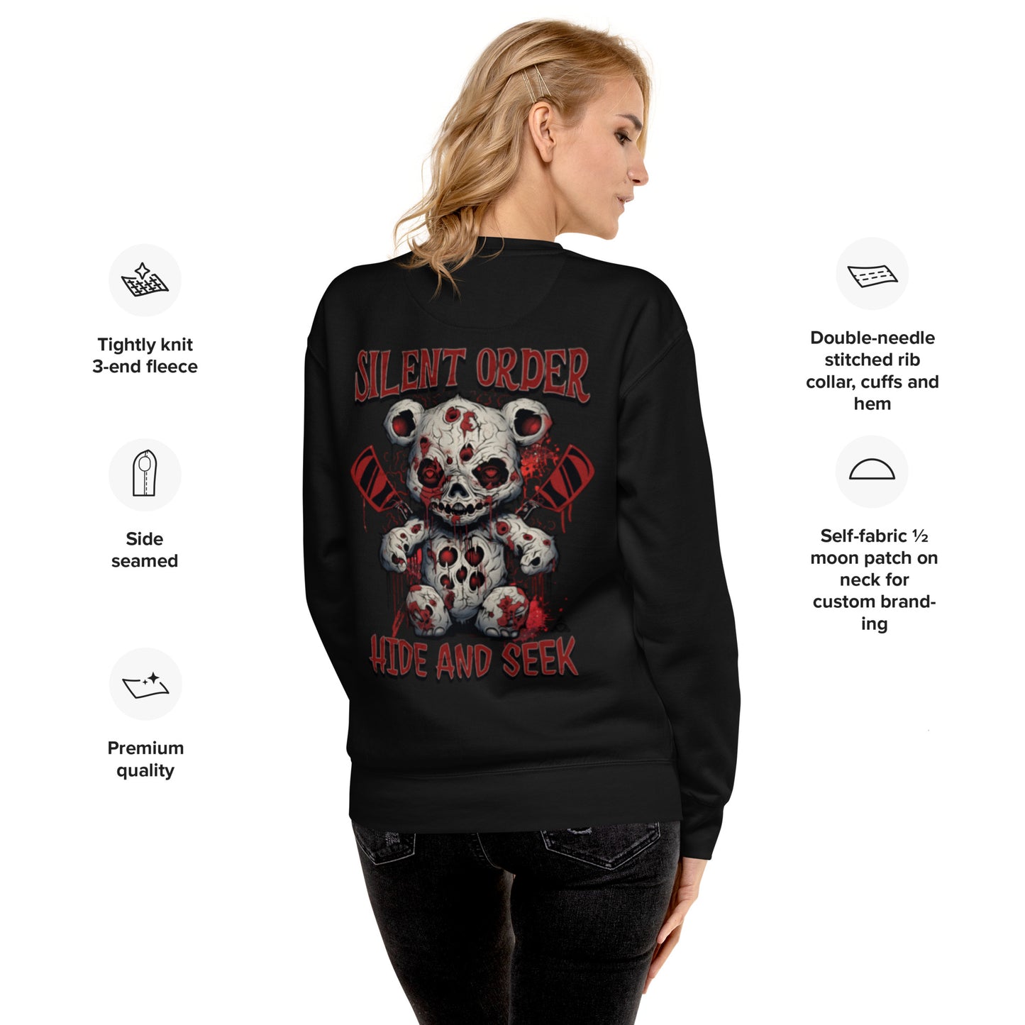 Person wearing a black sweatshirt with a graphic design on the back, featuring text and a bear illustration.