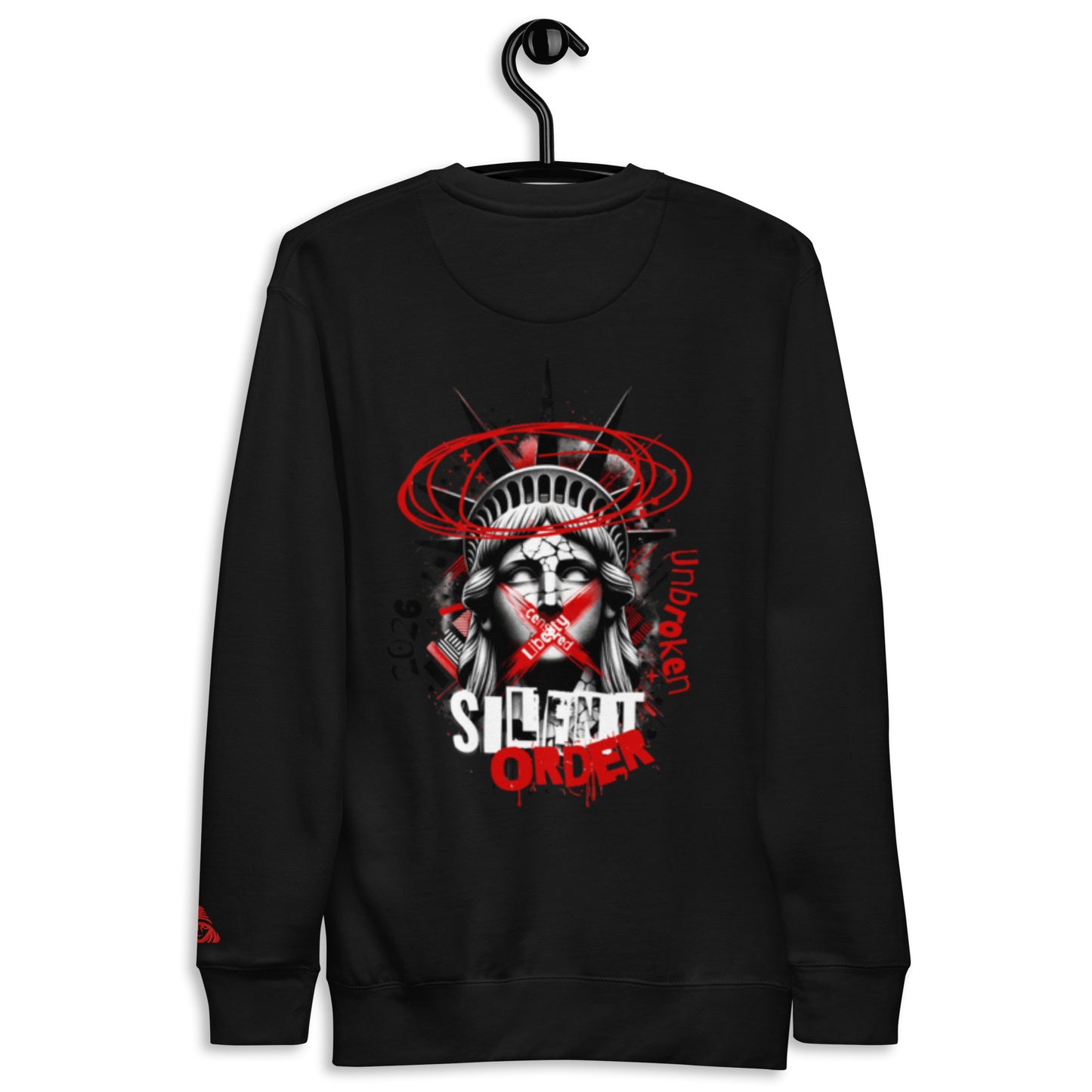 Black sweatshirt with graphic design of a face with crossed-out eyes and 'Silent Order' text, on a hanger against a white background.