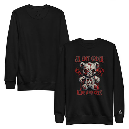 Black sweatshirt with a graphic design of a teddy bear skull and text 'Silent Order Hide and Seek' on a white background.