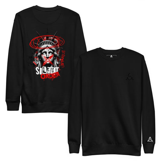 Black sweatshirt with graphic design featuring a face with horns and text on a white background