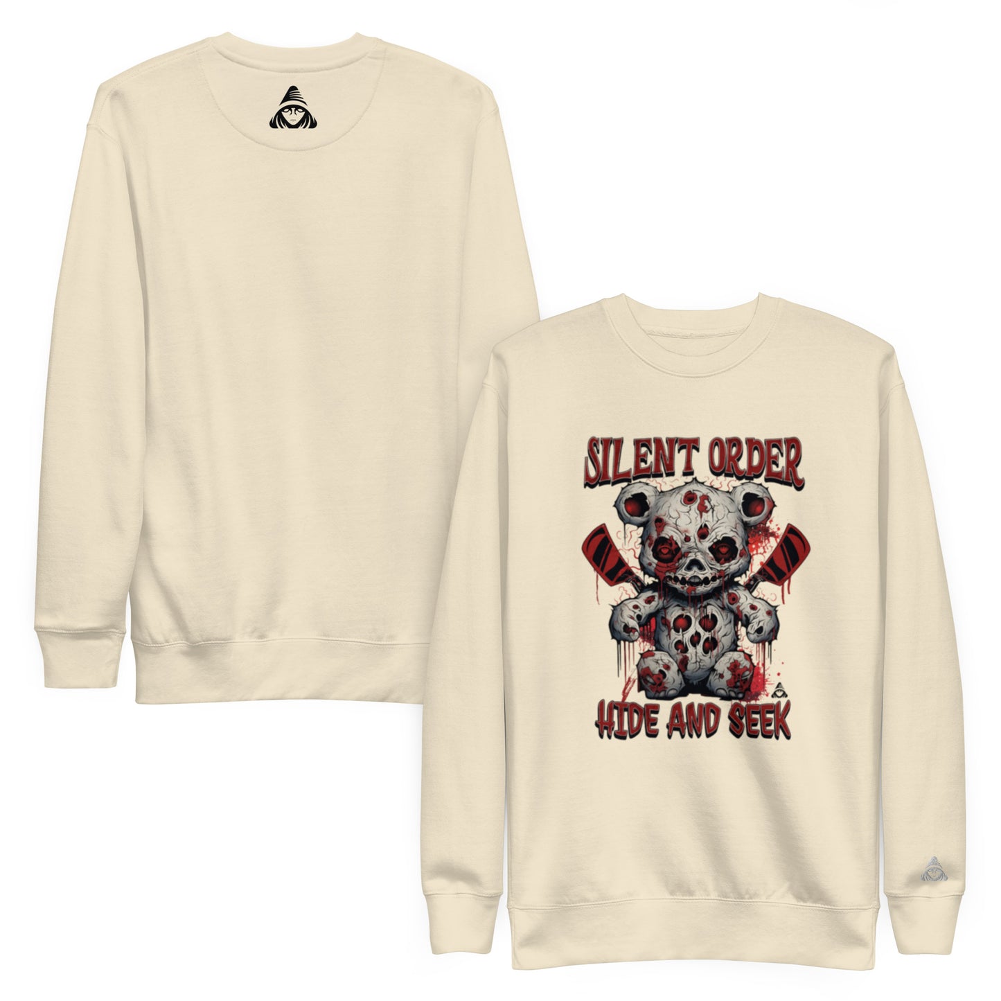 Beige sweatshirt with a graphic design of a skull and text 'Silent Order Hide and Seek' on a white background.